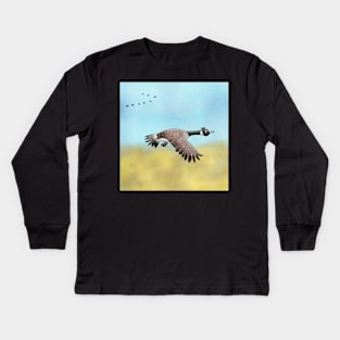 Canada Goose flying south for the Winter. Kids Long Sleeve T-Shirt